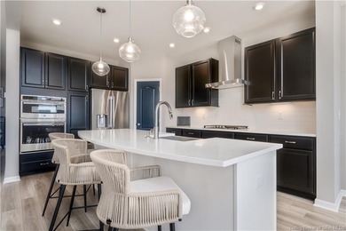 STUNNING HOME IN CHAMPIONS POINTE, LESS THAN ONE YEAR OLD! This on Champions Pointe Golf Course in Indiana - for sale on GolfHomes.com, golf home, golf lot