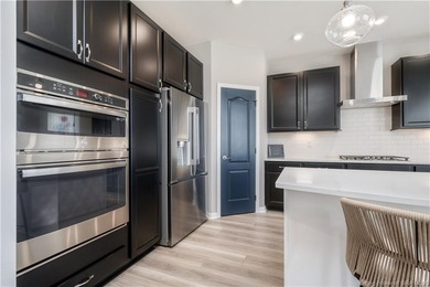 STUNNING HOME IN CHAMPIONS POINTE, LESS THAN ONE YEAR OLD! This on Champions Pointe Golf Course in Indiana - for sale on GolfHomes.com, golf home, golf lot