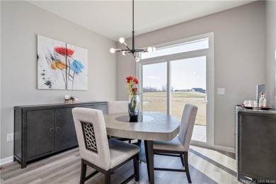 STUNNING HOME IN CHAMPIONS POINTE, LESS THAN ONE YEAR OLD! This on Champions Pointe Golf Course in Indiana - for sale on GolfHomes.com, golf home, golf lot