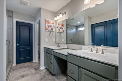 STUNNING HOME IN CHAMPIONS POINTE, LESS THAN ONE YEAR OLD! This on Champions Pointe Golf Course in Indiana - for sale on GolfHomes.com, golf home, golf lot