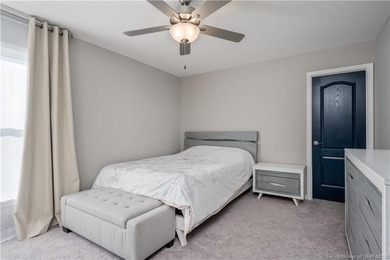 STUNNING HOME IN CHAMPIONS POINTE, LESS THAN ONE YEAR OLD! This on Champions Pointe Golf Course in Indiana - for sale on GolfHomes.com, golf home, golf lot