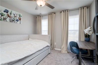 STUNNING HOME IN CHAMPIONS POINTE, LESS THAN ONE YEAR OLD! This on Champions Pointe Golf Course in Indiana - for sale on GolfHomes.com, golf home, golf lot