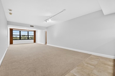 Enjoy top-floor living in this desirable fourth-floor corner on Bear Lakes Country Club in Florida - for sale on GolfHomes.com, golf home, golf lot