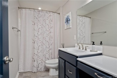 STUNNING HOME IN CHAMPIONS POINTE, LESS THAN ONE YEAR OLD! This on Champions Pointe Golf Course in Indiana - for sale on GolfHomes.com, golf home, golf lot