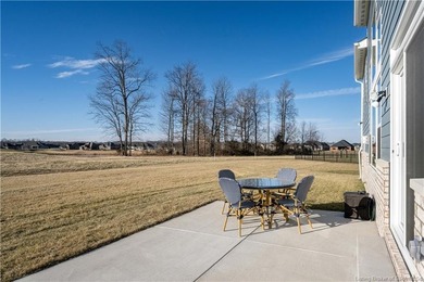 STUNNING HOME IN CHAMPIONS POINTE, LESS THAN ONE YEAR OLD! This on Champions Pointe Golf Course in Indiana - for sale on GolfHomes.com, golf home, golf lot