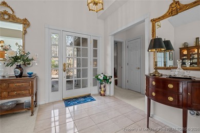 Discover serene golf course living in the prestigious gated on Carolina Trace Country Club in North Carolina - for sale on GolfHomes.com, golf home, golf lot