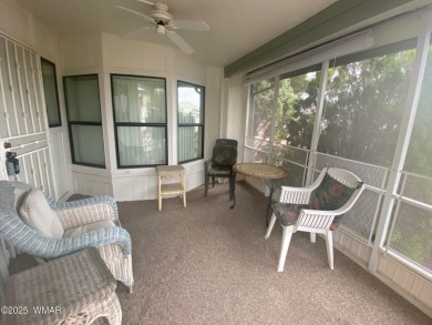 This spacious park model features lots of windows, a woodburning on Juniper Ridge R.V. Golf Resort in Arizona - for sale on GolfHomes.com, golf home, golf lot
