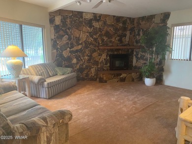 This spacious park model features lots of windows, a woodburning on Juniper Ridge R.V. Golf Resort in Arizona - for sale on GolfHomes.com, golf home, golf lot