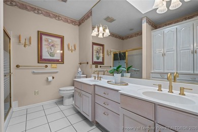 Discover serene golf course living in the prestigious gated on Carolina Trace Country Club in North Carolina - for sale on GolfHomes.com, golf home, golf lot