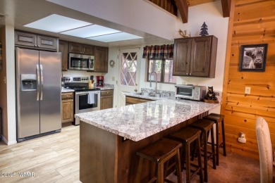Located in Pinetop Country Club. Multi-level Chalet style home on Pinetop Lakes Country Club in Arizona - for sale on GolfHomes.com, golf home, golf lot