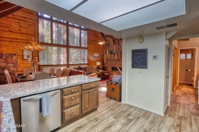 Located in Pinetop Country Club. Multi-level Chalet style home on Pinetop Lakes Country Club in Arizona - for sale on GolfHomes.com, golf home, golf lot