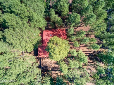 Located in Pinetop Country Club. Multi-level Chalet style home on Pinetop Lakes Country Club in Arizona - for sale on GolfHomes.com, golf home, golf lot