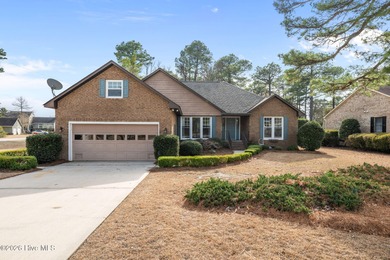 This well-maintained brick home sits on a spacious corner lot in on Harbour Point Golf Club in North Carolina - for sale on GolfHomes.com, golf home, golf lot