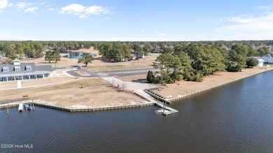 This well-maintained brick home sits on a spacious corner lot in on Harbour Point Golf Club in North Carolina - for sale on GolfHomes.com, golf home, golf lot