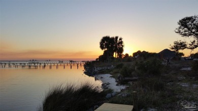 This exceptional .57-acre corner waterfront lot is a rare gem on Tiger Point Golf and Country Club in Florida - for sale on GolfHomes.com, golf home, golf lot