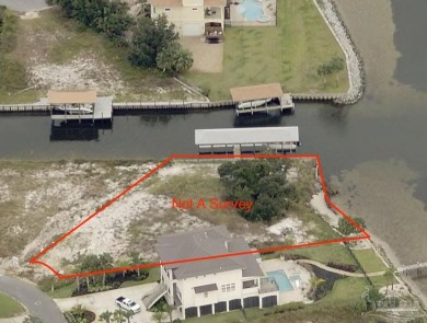 This exceptional .57-acre corner waterfront lot is a rare gem on Tiger Point Golf and Country Club in Florida - for sale on GolfHomes.com, golf home, golf lot