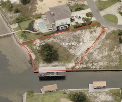 This exceptional .57-acre corner waterfront lot is a rare gem on Tiger Point Golf and Country Club in Florida - for sale on GolfHomes.com, golf home, golf lot