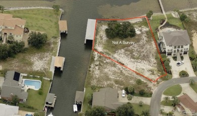 This exceptional .57-acre corner waterfront lot is a rare gem on Tiger Point Golf and Country Club in Florida - for sale on GolfHomes.com, golf home, golf lot