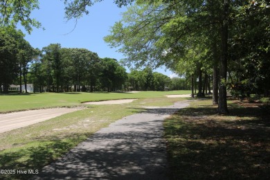 Lovely wooded lot along Fairway #3 in Lockwood Folly Country on Lockwood Folly Country Club in North Carolina - for sale on GolfHomes.com, golf home, golf lot