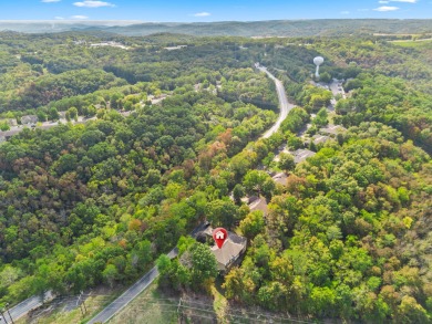 Rejuvenating Gated Retreat in StoneBridge VillageEscape to on Ledgestone Country Club and Golf Course in Missouri - for sale on GolfHomes.com, golf home, golf lot