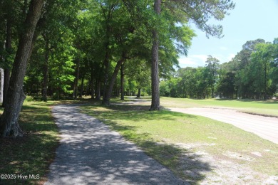 Lovely wooded lot along Fairway #3 in Lockwood Folly Country on Lockwood Folly Country Club in North Carolina - for sale on GolfHomes.com, golf home, golf lot