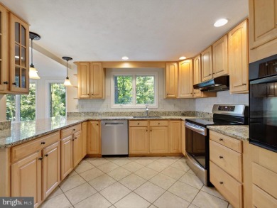 BAY HILLS! At first glance, this may look like your classic on Bay Hills Golf Club in Maryland - for sale on GolfHomes.com, golf home, golf lot