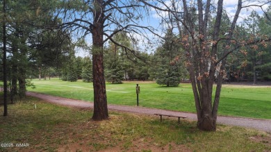 Experience comfort and privacy in this 5-bedroom, 6-bathroom on Pinetop Lakes Country Club in Arizona - for sale on GolfHomes.com, golf home, golf lot