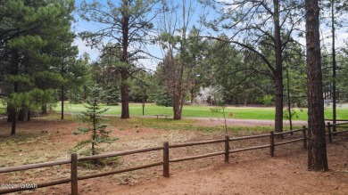 Experience comfort and privacy in this 5-bedroom, 6-bathroom on Pinetop Lakes Country Club in Arizona - for sale on GolfHomes.com, golf home, golf lot