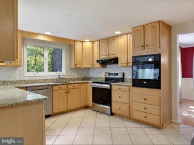 BAY HILLS! At first glance, this may look like your classic on Bay Hills Golf Club in Maryland - for sale on GolfHomes.com, golf home, golf lot