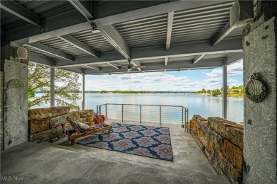 This exceptional, one-of-a-kind lake front property is simply on Lakeside Golf Course in Ohio - for sale on GolfHomes.com, golf home, golf lot