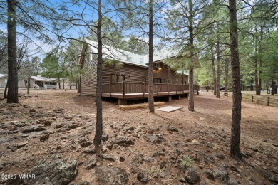 Experience comfort and privacy in this 5-bedroom, 6-bathroom on Pinetop Lakes Country Club in Arizona - for sale on GolfHomes.com, golf home, golf lot