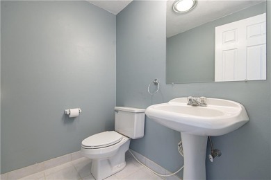 THIS METILCULOUSLY MAINTAINED, MOVE IN CONDITION 1300 SQ. FT on Louisquisset Golf Club in Rhode Island - for sale on GolfHomes.com, golf home, golf lot