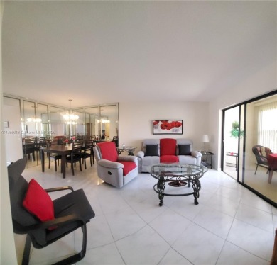MUST SEE! Beautifully UPDATED 3rd FLOOR 2/2 PENTHOUSE condo in on Sunrise Lakes Phase IV Golf Course in Florida - for sale on GolfHomes.com, golf home, golf lot
