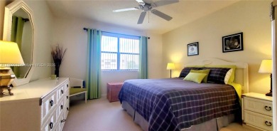 MUST SEE! Beautifully UPDATED 3rd FLOOR 2/2 PENTHOUSE condo in on Sunrise Lakes Phase IV Golf Course in Florida - for sale on GolfHomes.com, golf home, golf lot