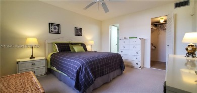 MUST SEE! Beautifully UPDATED 3rd FLOOR 2/2 PENTHOUSE condo in on Sunrise Lakes Phase IV Golf Course in Florida - for sale on GolfHomes.com, golf home, golf lot