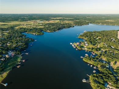 Look out on the lake from on high. With rocky bluffs, lots of on Twisted Oaks Golf Club in Texas - for sale on GolfHomes.com, golf home, golf lot