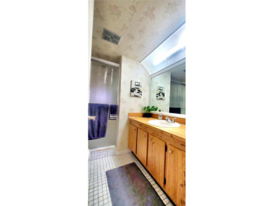 MUST SEE! Beautifully UPDATED 3rd FLOOR 2/2 PENTHOUSE condo in on Sunrise Lakes Phase IV Golf Course in Florida - for sale on GolfHomes.com, golf home, golf lot