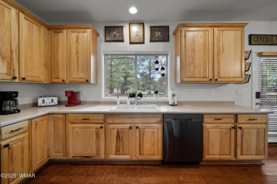 Experience comfort and privacy in this 5-bedroom, 6-bathroom on Pinetop Lakes Country Club in Arizona - for sale on GolfHomes.com, golf home, golf lot