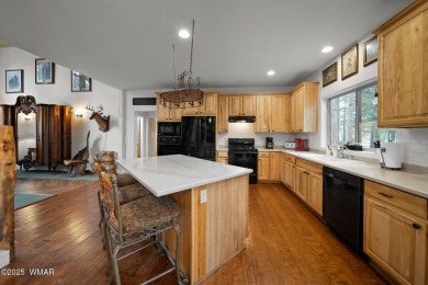 Experience comfort and privacy in this 5-bedroom, 6-bathroom on Pinetop Lakes Country Club in Arizona - for sale on GolfHomes.com, golf home, golf lot