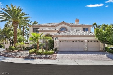 This stunning, custom-designed home is located in the highly on Rhodes Ranch Golf Club in Nevada - for sale on GolfHomes.com, golf home, golf lot