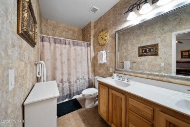 Experience comfort and privacy in this 5-bedroom, 6-bathroom on Pinetop Lakes Country Club in Arizona - for sale on GolfHomes.com, golf home, golf lot