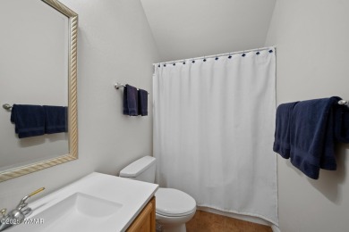 Experience comfort and privacy in this 5-bedroom, 6-bathroom on Pinetop Lakes Country Club in Arizona - for sale on GolfHomes.com, golf home, golf lot