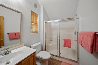 Experience comfort and privacy in this 5-bedroom, 6-bathroom on Pinetop Lakes Country Club in Arizona - for sale on GolfHomes.com, golf home, golf lot