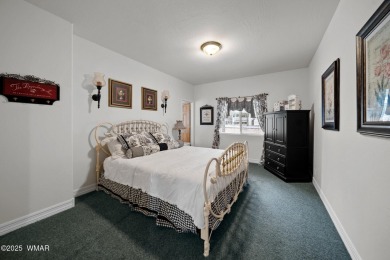 Experience comfort and privacy in this 5-bedroom, 6-bathroom on Pinetop Lakes Country Club in Arizona - for sale on GolfHomes.com, golf home, golf lot