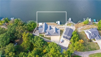 This exceptional, one-of-a-kind lake front property is simply on Lakeside Golf Course in Ohio - for sale on GolfHomes.com, golf home, golf lot