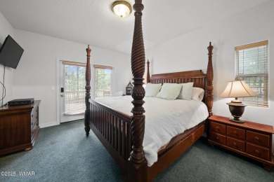 Experience comfort and privacy in this 5-bedroom, 6-bathroom on Pinetop Lakes Country Club in Arizona - for sale on GolfHomes.com, golf home, golf lot