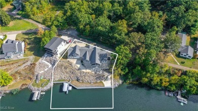 This exceptional, one-of-a-kind lake front property is simply on Lakeside Golf Course in Ohio - for sale on GolfHomes.com, golf home, golf lot