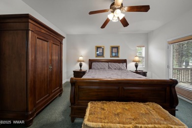 Experience comfort and privacy in this 5-bedroom, 6-bathroom on Pinetop Lakes Country Club in Arizona - for sale on GolfHomes.com, golf home, golf lot