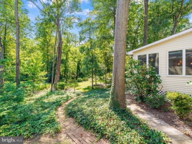 BAY HILLS! At first glance, this may look like your classic on Bay Hills Golf Club in Maryland - for sale on GolfHomes.com, golf home, golf lot