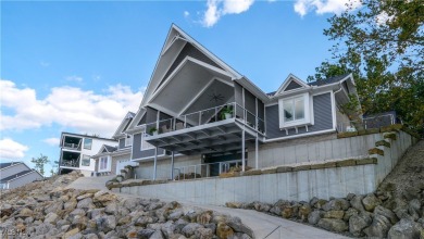 This exceptional, one-of-a-kind lake front property is simply on Lakeside Golf Course in Ohio - for sale on GolfHomes.com, golf home, golf lot